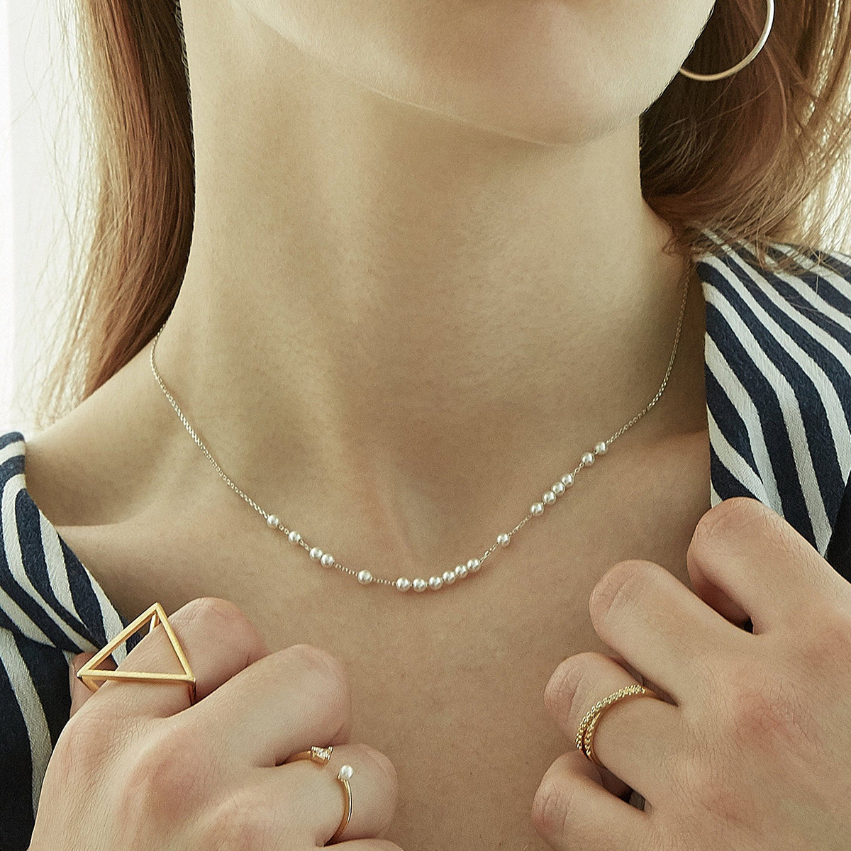 The Relay Pearl Arc Necklace